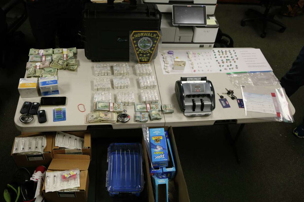 Cash and drug-related materials seized by police in the arrest of Joseph Daniels.