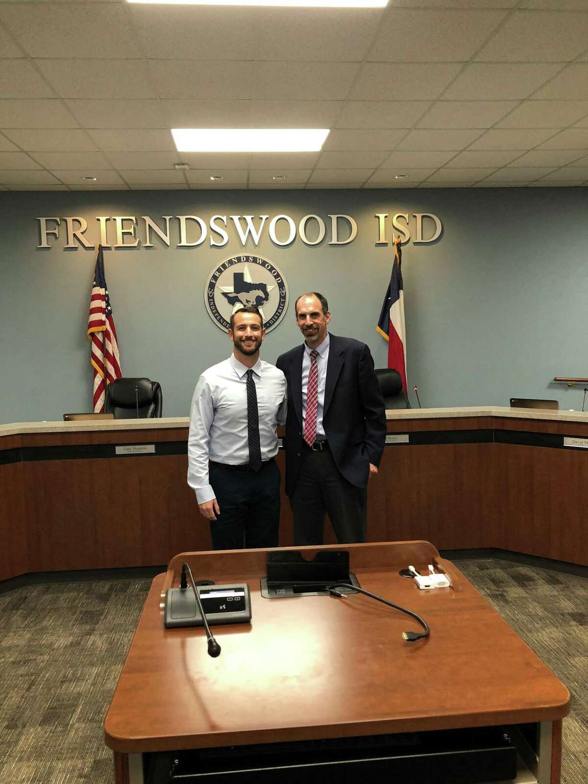 Cory Benavides (left) has been hired as the new head baseball coach at Friendswood High School. Benavides is shown with Friendswood ISD superintendent Thad Roher.