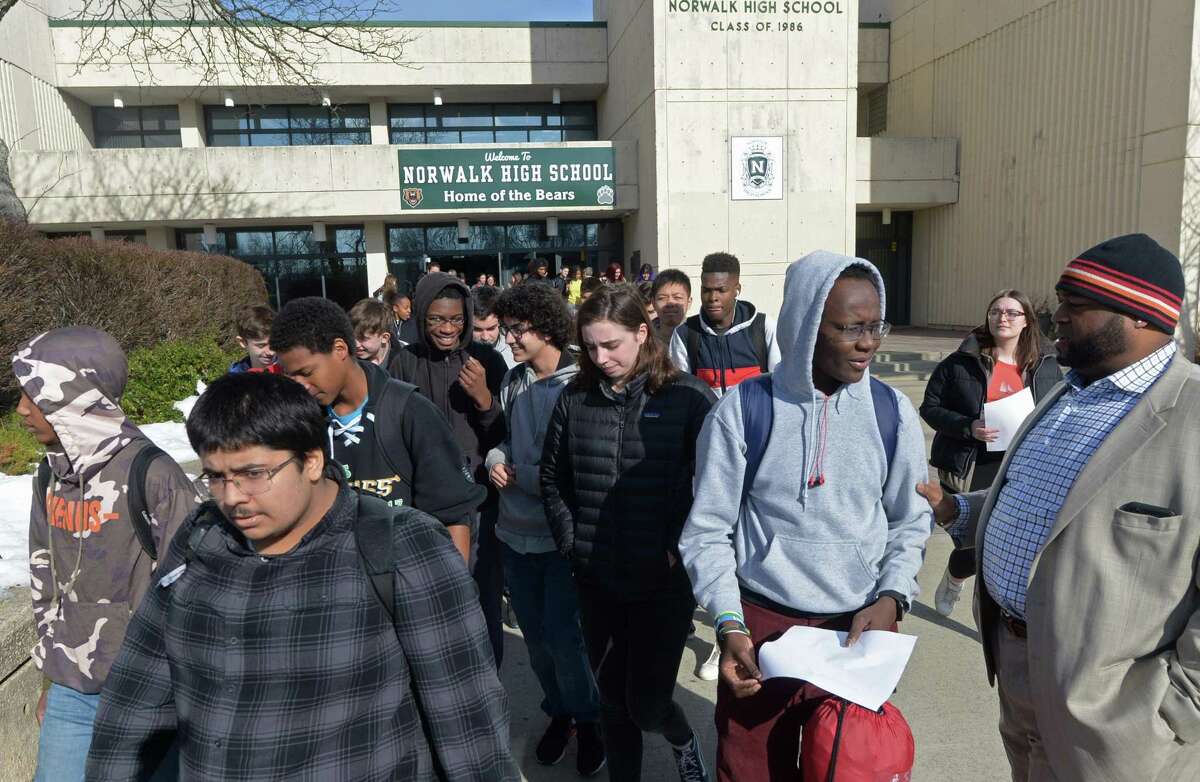 Norwalk High School students outside the school in March.
