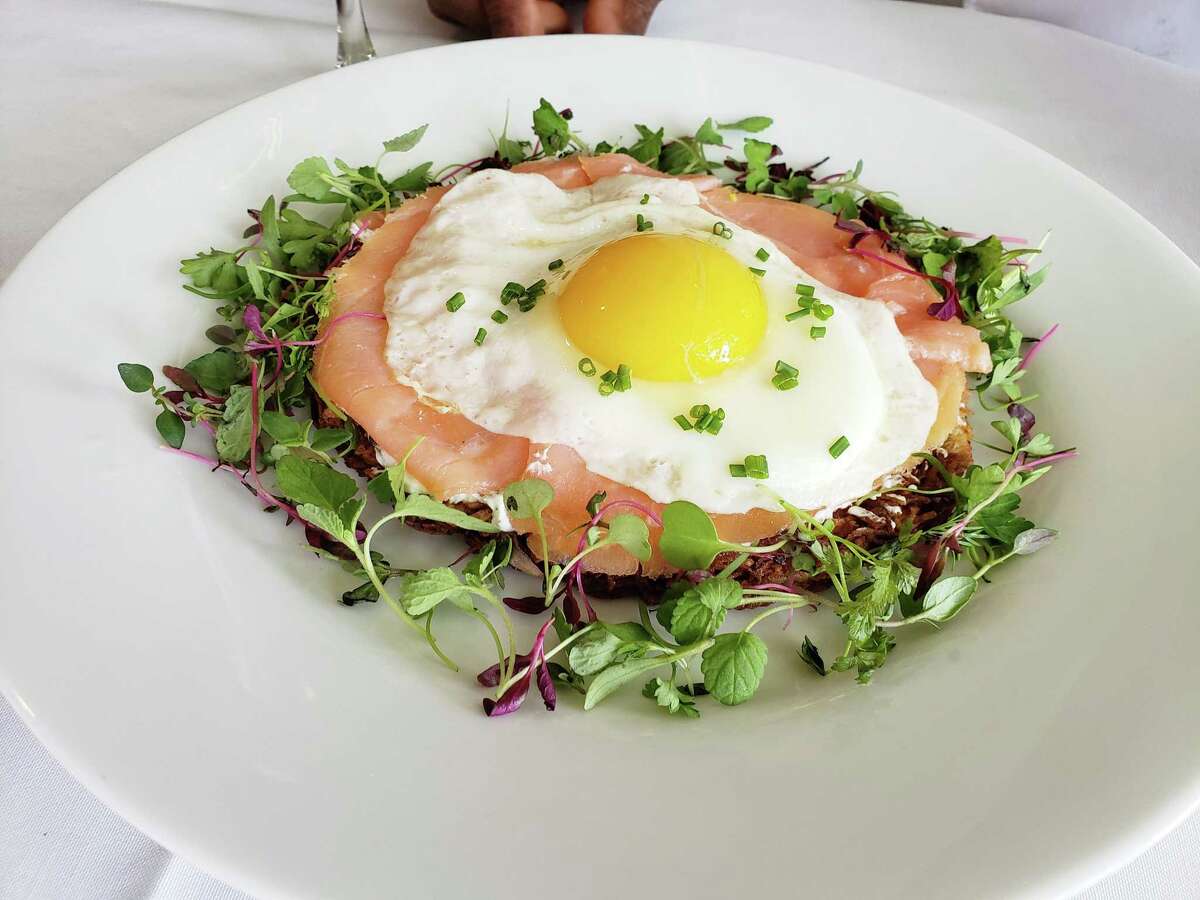 A potato pancake topped with house smoked salmon and a sunny side up egg from the Royal Wedding Viewing menu at the Roger Sherman Inn in New Canaan.