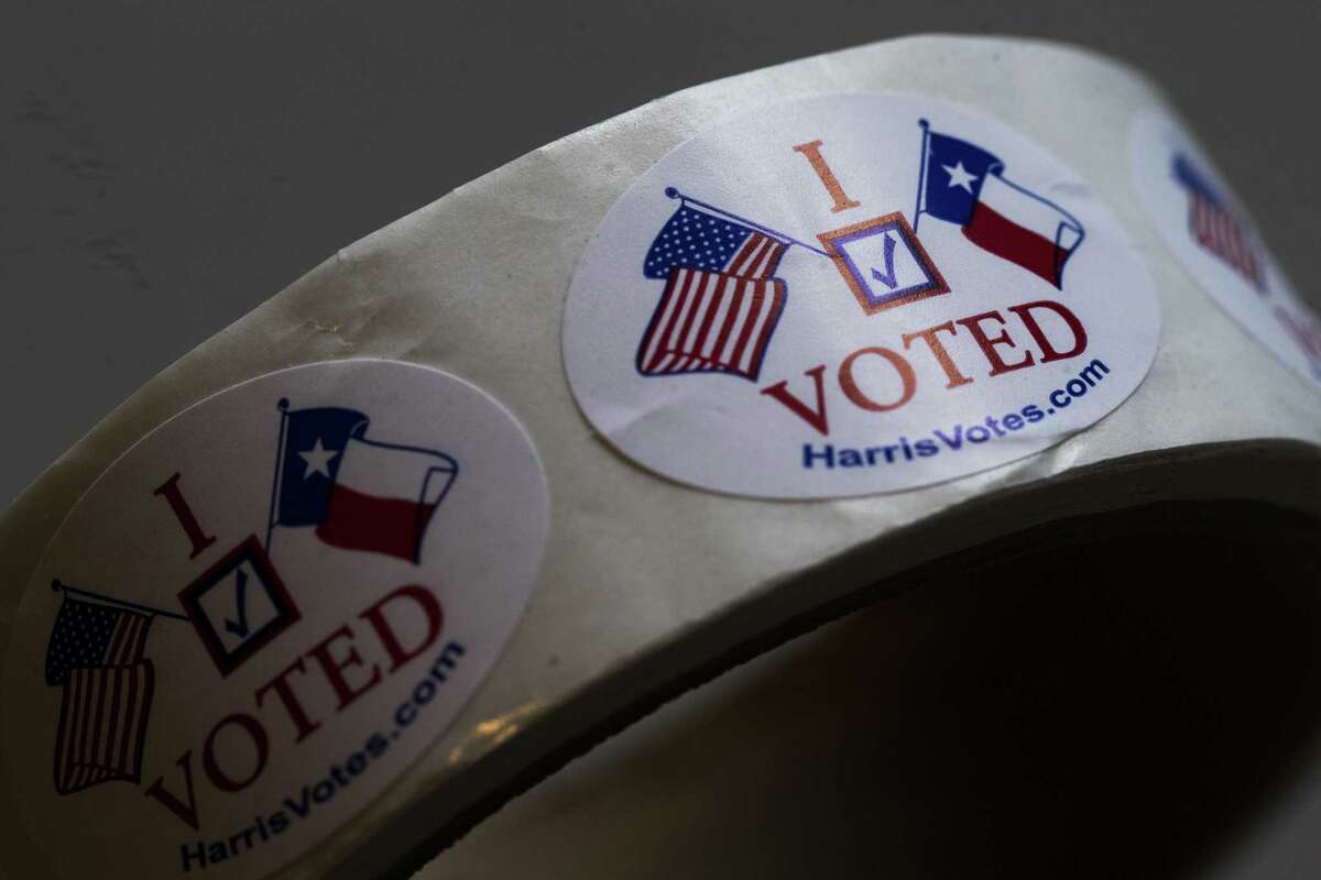 “I Voted” stickers ready to be distributed sit on top of a table at a polling place, Saturday, May 5, 2018, on special election day in Houston.