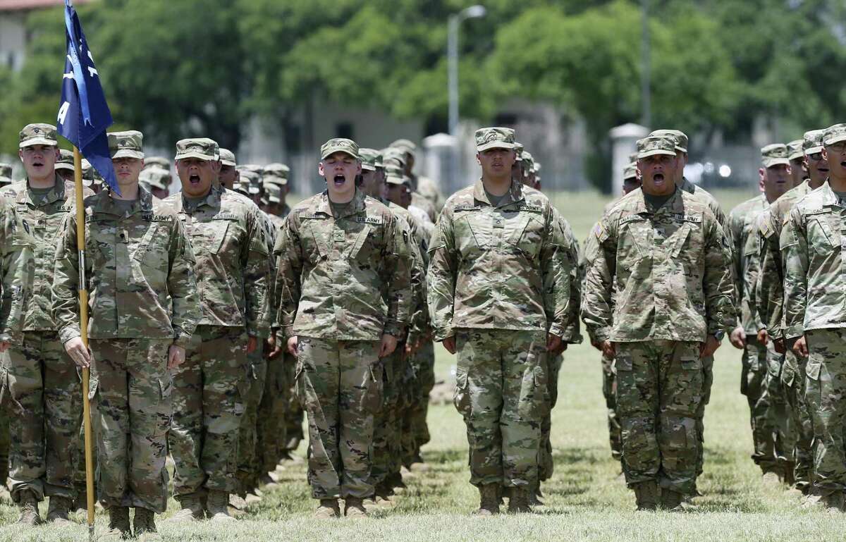 Soldiers with the Texas Army National Guard 1st Battalion, 141st Infantry Regiment of the 72nd Infantry Brigade Combat Team line up in formation during their deployment ceremony at Fort Sam Houston, Wednesday, May 16, 2018. The battalion, numbering close to 500, will deploy to the Horn of Africa.