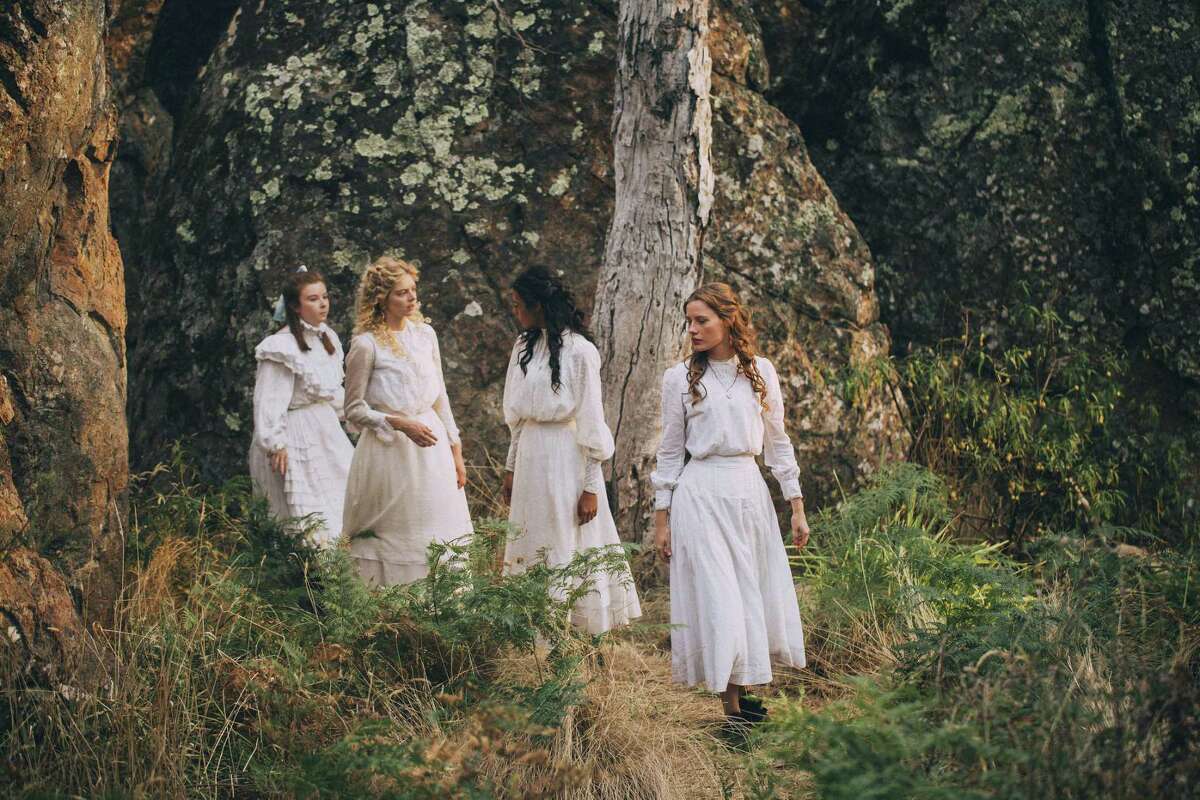 The girls at the heart of the mystery in "Picnic at Hanging Rock"  -- from right,  Miranda (Lily Sullivan), Irma (Samara Weaving) and Marion (Madeleine Madden) -- in Amazon Prime's new six-part adaptation of the Australian novel.