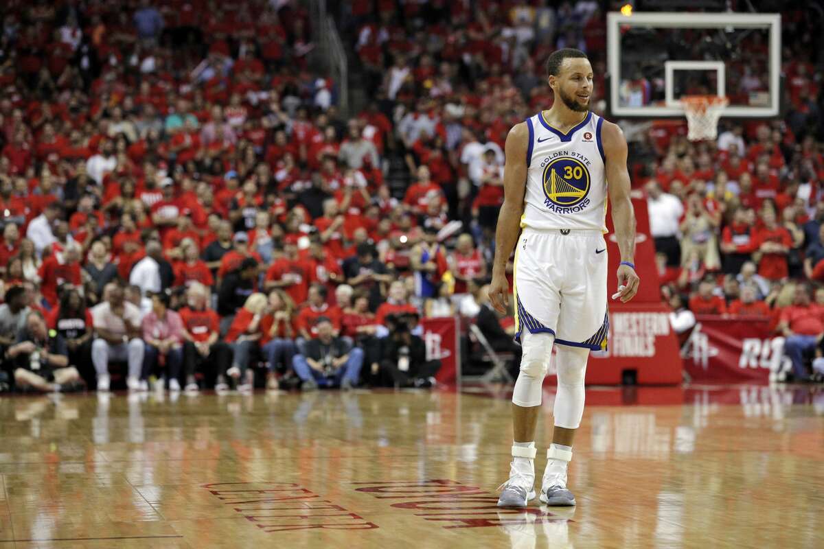 Stephen Curry (30) walks up the court after a play went against the Warriors in the second half as the Golden State Warriors played by the Houston Rockets in Game 2 of the Western Conference Finals at Toyota Center in Houston, Texas, on Wednesday, May 16, 2018. The Rockets won 127-105.