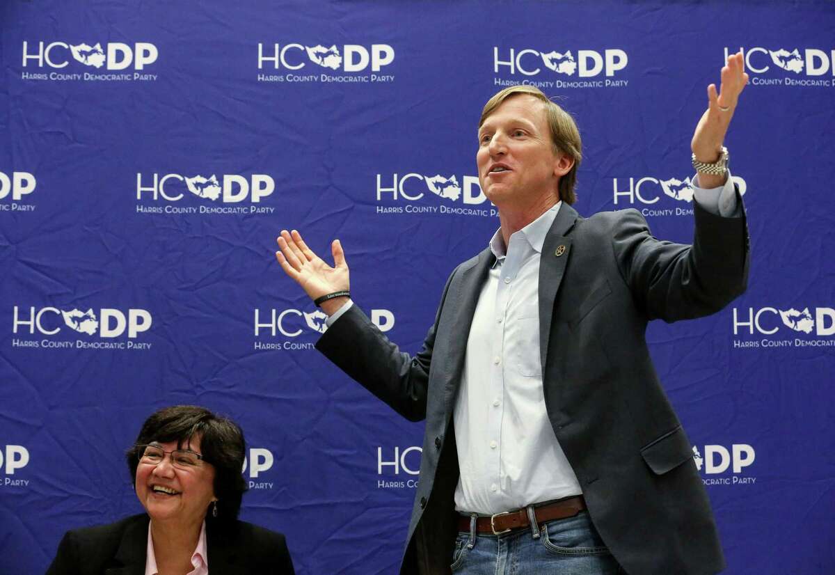 Gubernatorial Candidates Andrew White, right, and Lupe Valdez laugh at an comment from the audience at a reception for Democratic run-off candidates, Wednesday, April 25, 2018, in Houston. ( Jon Shapley / Houston Chronicle )