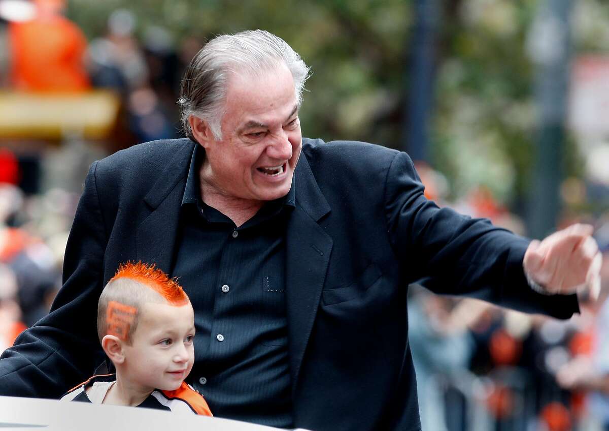 Longtime clubhouse manager Mike Murphy rode with his grandson in the parade. The San Francisco Giants celebrated their second World Series title in three years with a parade down Market Street Wednesday October 31, 2012.