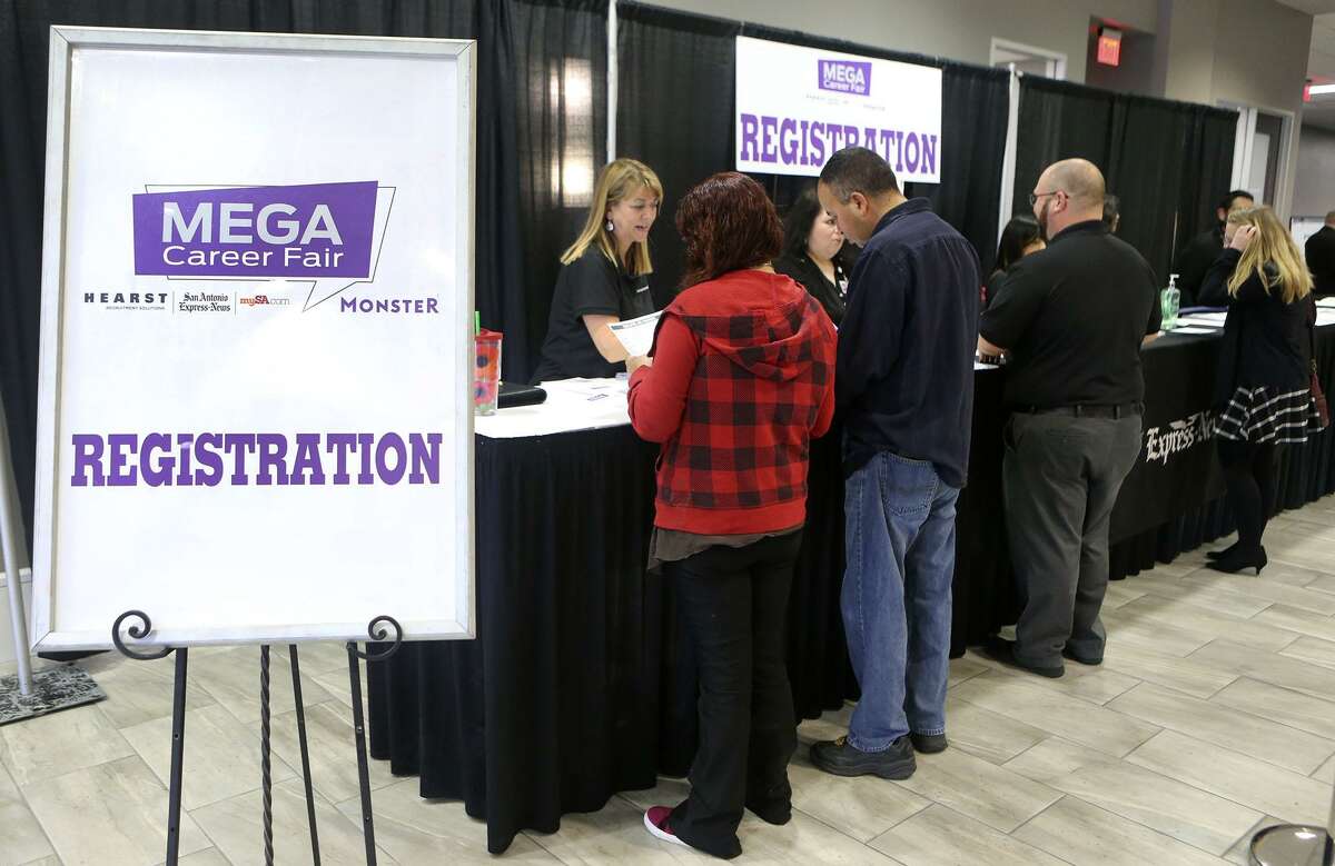 People register Wednesday February 21, 2018 at the Mega Career Fair at the Norris Conference Center on Loop 410. Twenty six companies were represented at the event offering employment in manufacturing, transportation, healthcare and more.