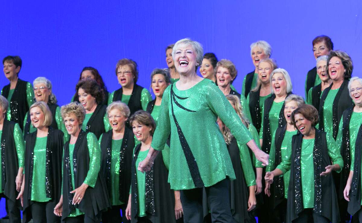 Members of The Woodlands Show Chorus, an organization of more than 70 female barbershop singers, with director Betty Clipman. The Woodlands Show Chorus invites all to preview a Zoom performance of its entry in the Sweet Adelines 75th Worldwide Competition in St. Louis Oct. 11-16, 2021, according to Brenda Anderson, member and publicist. The preview is on Oct. 12.