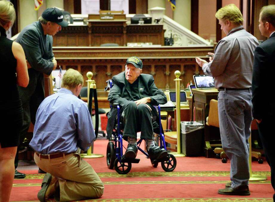 Sidney Walton, 99, one of the oldest WWII vets in the country, is interviewed by the Capitol press corps during his visit to meet Gov. Andrew Cuomo Friday May 18, 2018 in Albany,NY. Walton hopes to meet all 50 governors before getting to the White House on his 100th birthday on Feb. 11.  (John Carl D'Annibale/Times Union) Photo: John Carl D'Annibale, Albany Times Union / 20043830A