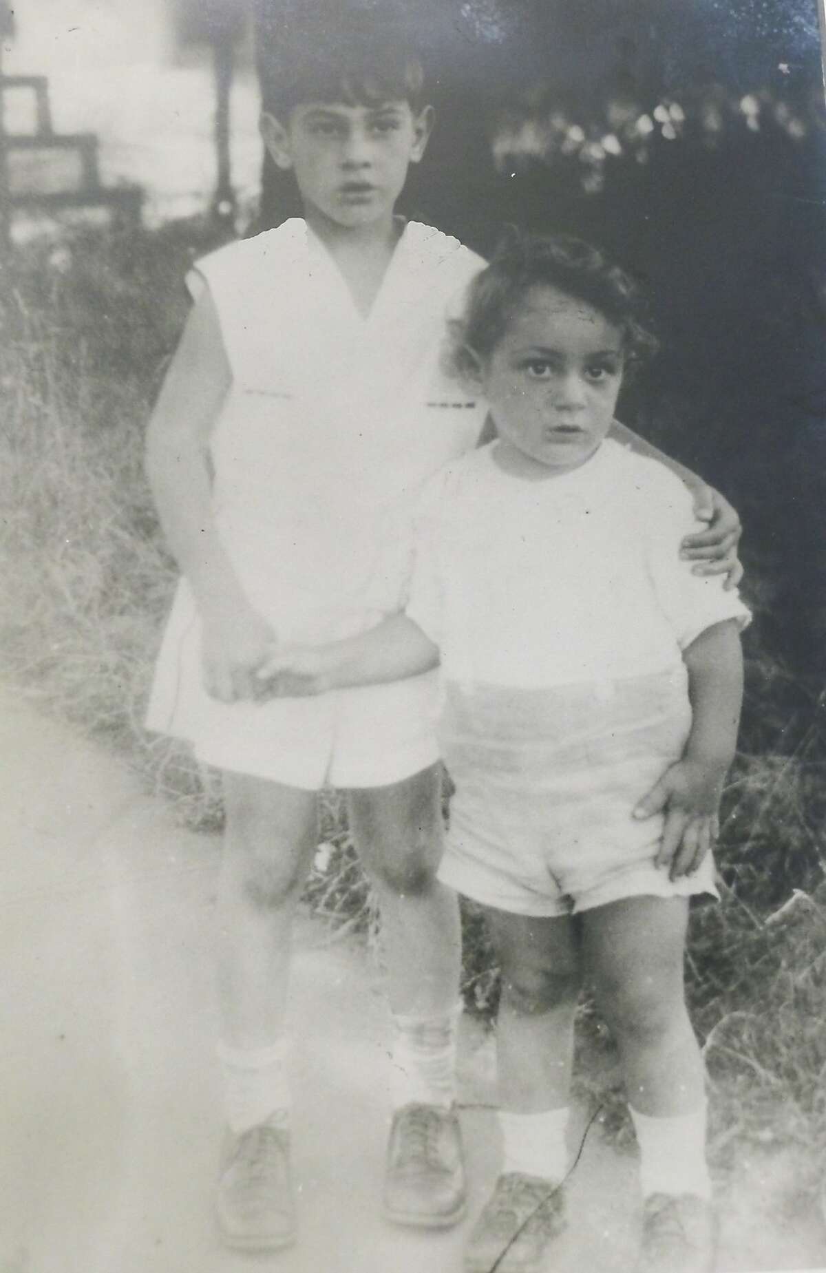 Harvey Milk (right), age three, with his brother, Robert, in 1933.
