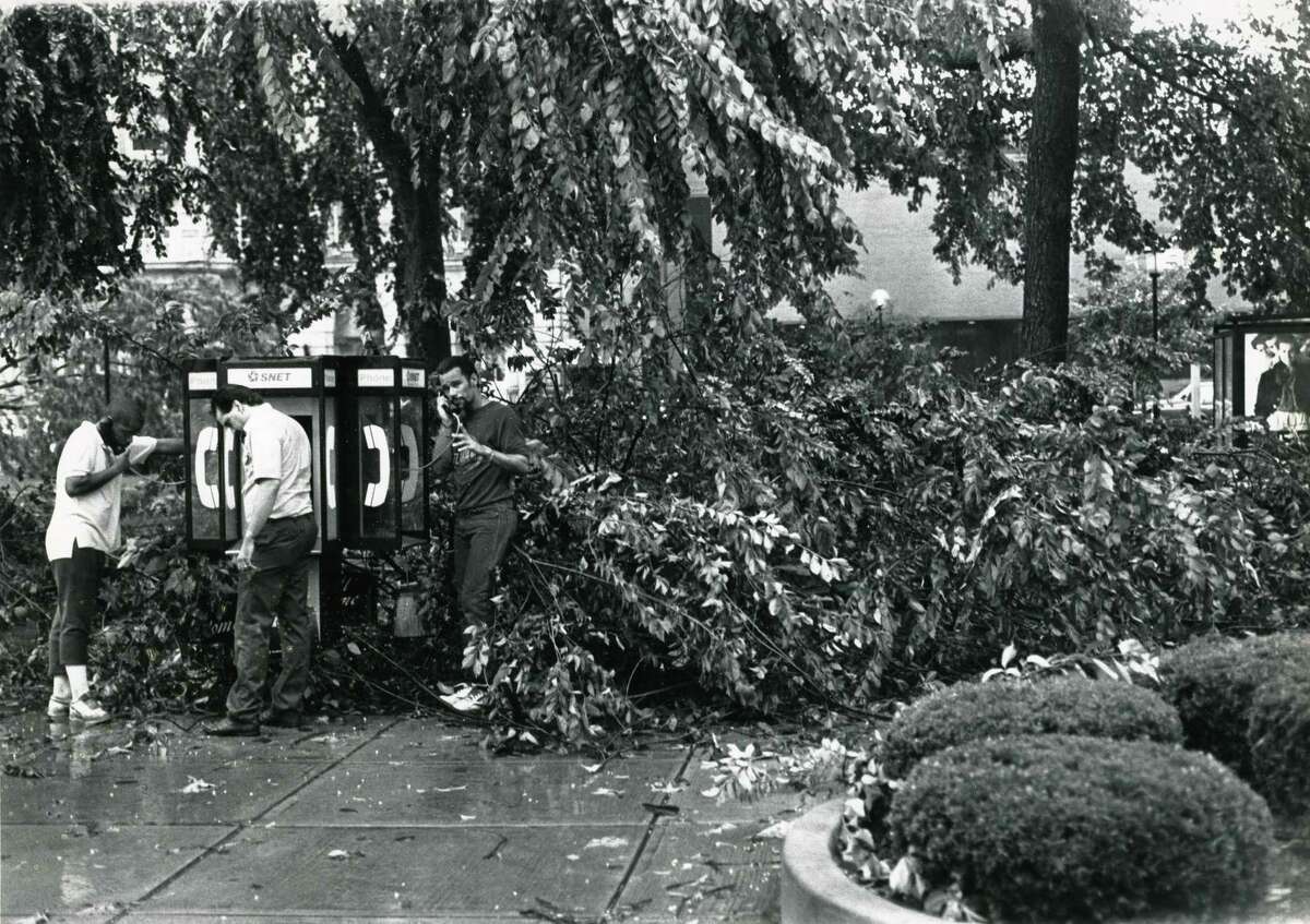 This file photo from July 10, 1989, shows damage to the Waterbury Green after a tornado swept from the northwest corner of the state to New Haven, leveling homes, snapping trees and leaving a trail of fear. (AP Photo/The Republican- American, Steve Valenti)