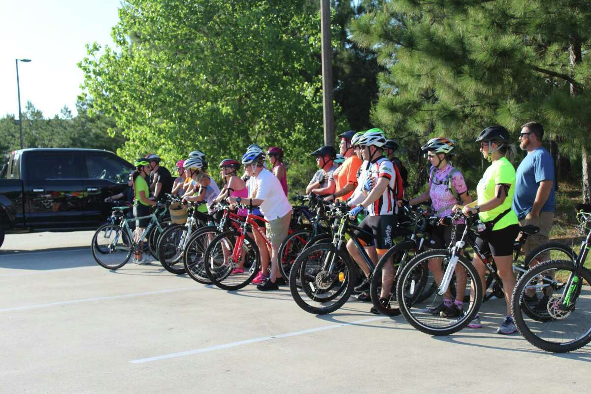 Cyclists gather in the parking lot at Rob Fleming Park on Wednesday, May 16, for the inaugural Ride of Silence in The Woodlands.