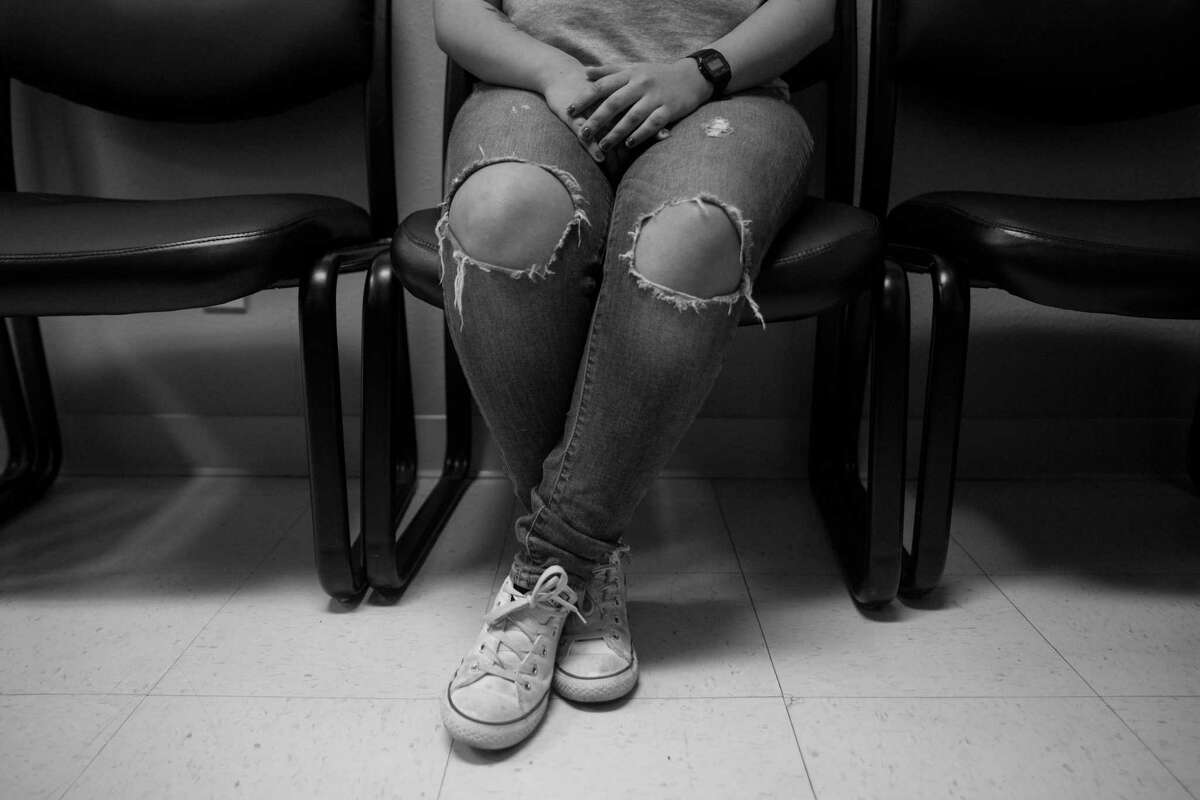 Kristen, 18, waits to have a medical abortion in the Whole Woman's Health in San Antonio, Texas on March 16, 2017. She had to make a nine hour roundtrip bus ride from the military base where she is stationed in Del Rio, Texas. She said she and her boyfriend are not ready to be parents.