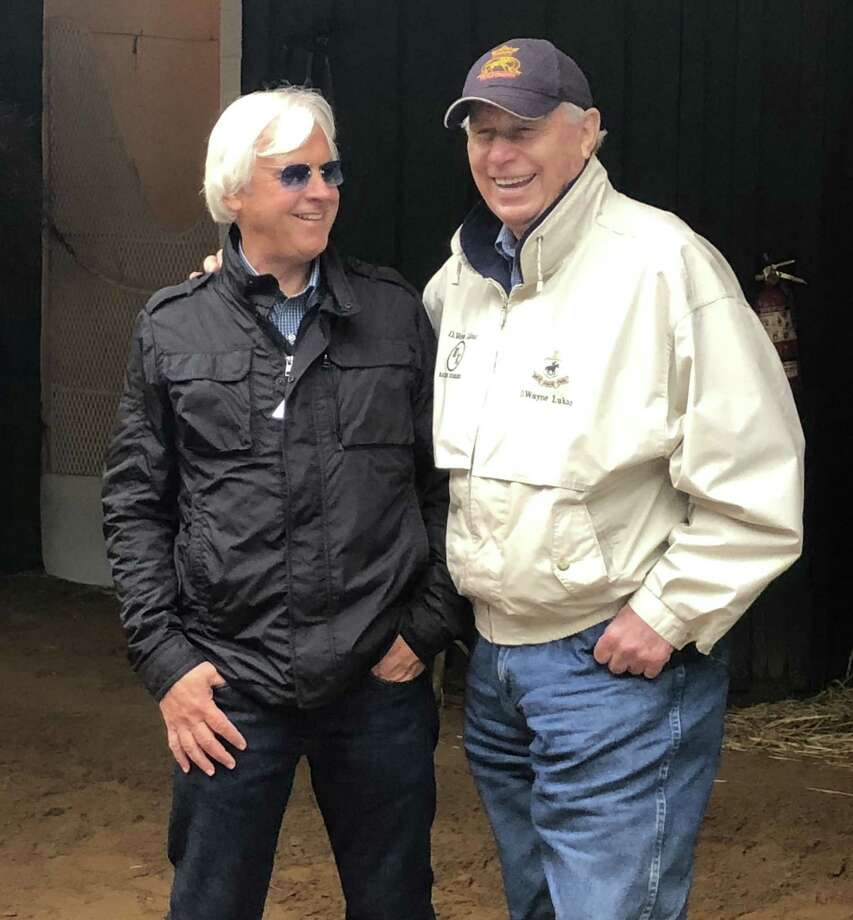 The day before the Preakness was to be run, rival trainers Bob Baffert, left, and D. Wayne Lukas still found time to have a few laughs outside the Stakes Barn at Pimlico Race Course. Baffert trains Preakness favorite Justify while Lukas will try to spoil the party with a pair of long shots, Bravazo and Sporting Chance. Baffert and Lukas are old pals and had plenty to talk about. The two Hall of Famers even got around to talking about the horses! (Tim Wilkin / Times Union)