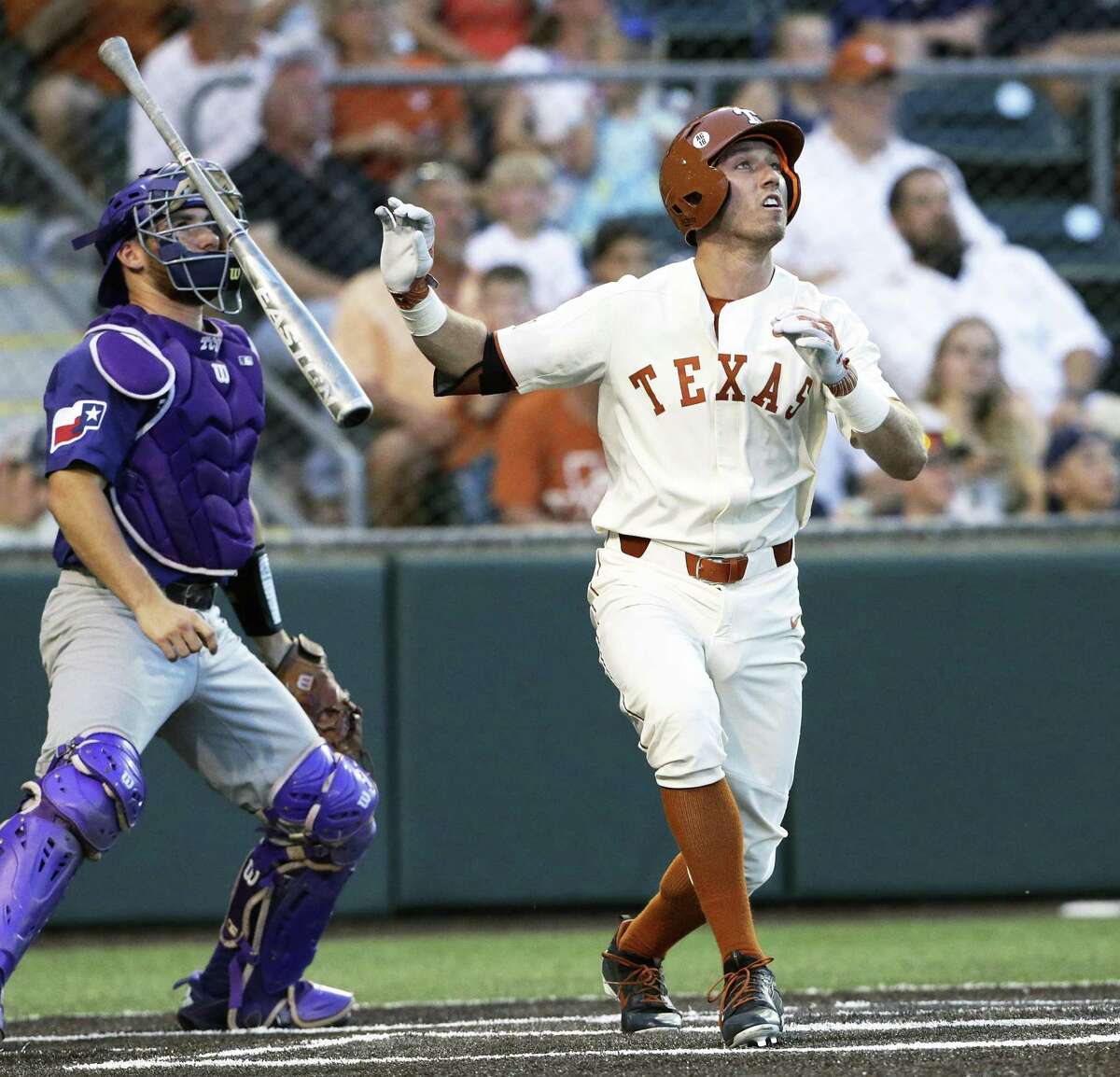 Kody Clemens watches his shot to right field clear the fence for a 2 run homer to tie the game 3-3 in the fifth inning as UT hosts TCU in men's baseball at Disch-Falk Field on May 18, 2018.