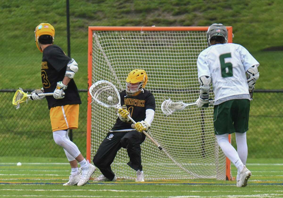 Goalie Patrick Burkinshaw (1) of the Brunswick Bruins makes a save during a game against the Berkshire Bears at the Brunswick School School on Saturday May 19, 2018, in Greenwich, Connecticut.