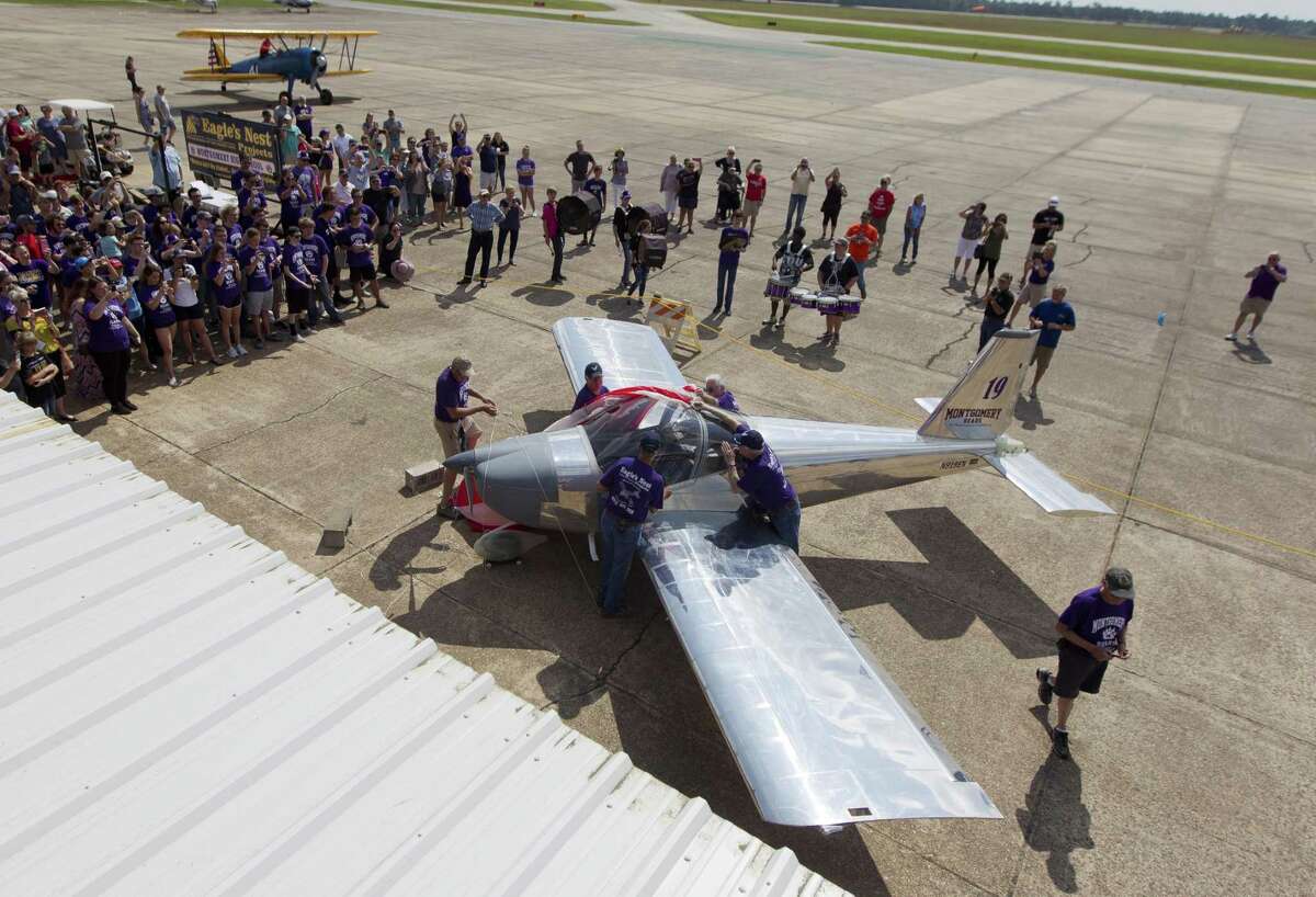 Bear Force 1, a Van’s Aircraft RV-12 airplane built by Montgomery High School’s aerospace engineering class, is unveiled before its inaugural public flight at the Conroe-North Houston Regional Airport on Saturday, May 19, 2018, in Conroe.