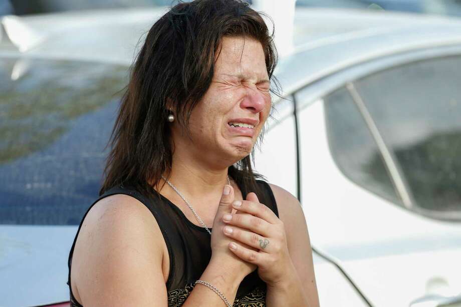 Sadie Blaze becomes emotional at a community pot luck Saturday, May 19, 2018, in Santa Fe. Blaze's daughter Shana Fisher, 16, was killed Friday in the Santa Fe High School shooting. Blaze said that shooting suspect Dimitrios Pagourtzis had been bulling her daughter and came to the school with the intent to kill her, and did. Photo: Steve Gonzales, Houston Chronicle / © 2018 Houston Chronicle