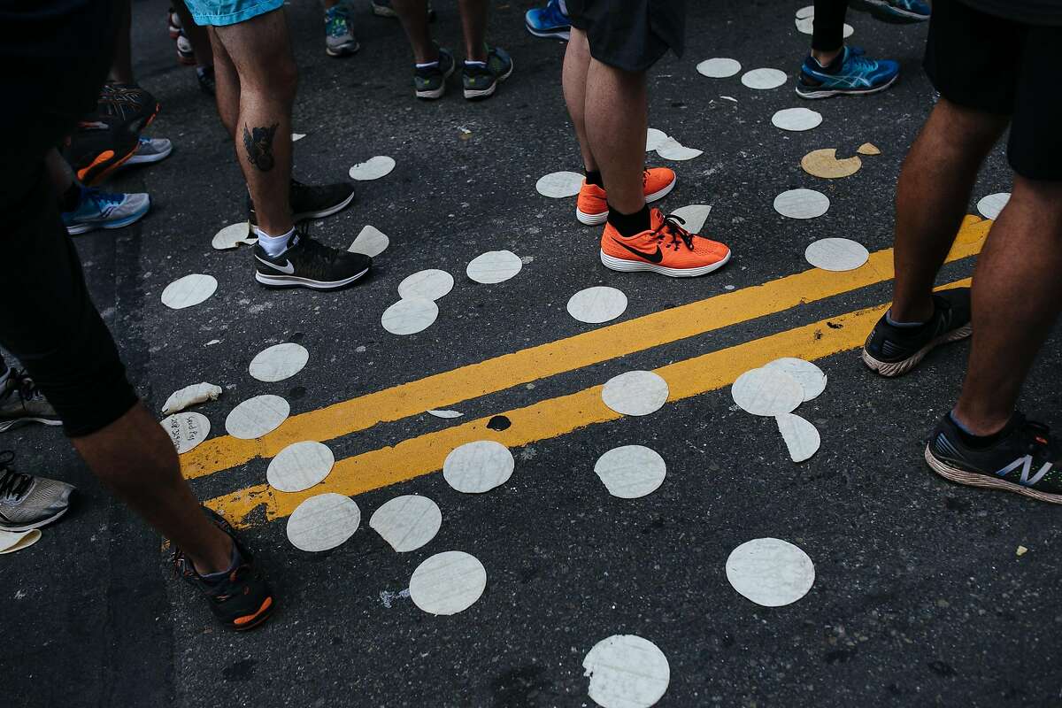 Tortillas are scattered near the starting line during the Bay to Breakers annual race in San Francisco, Calif., Sunday, May 20, 2018.