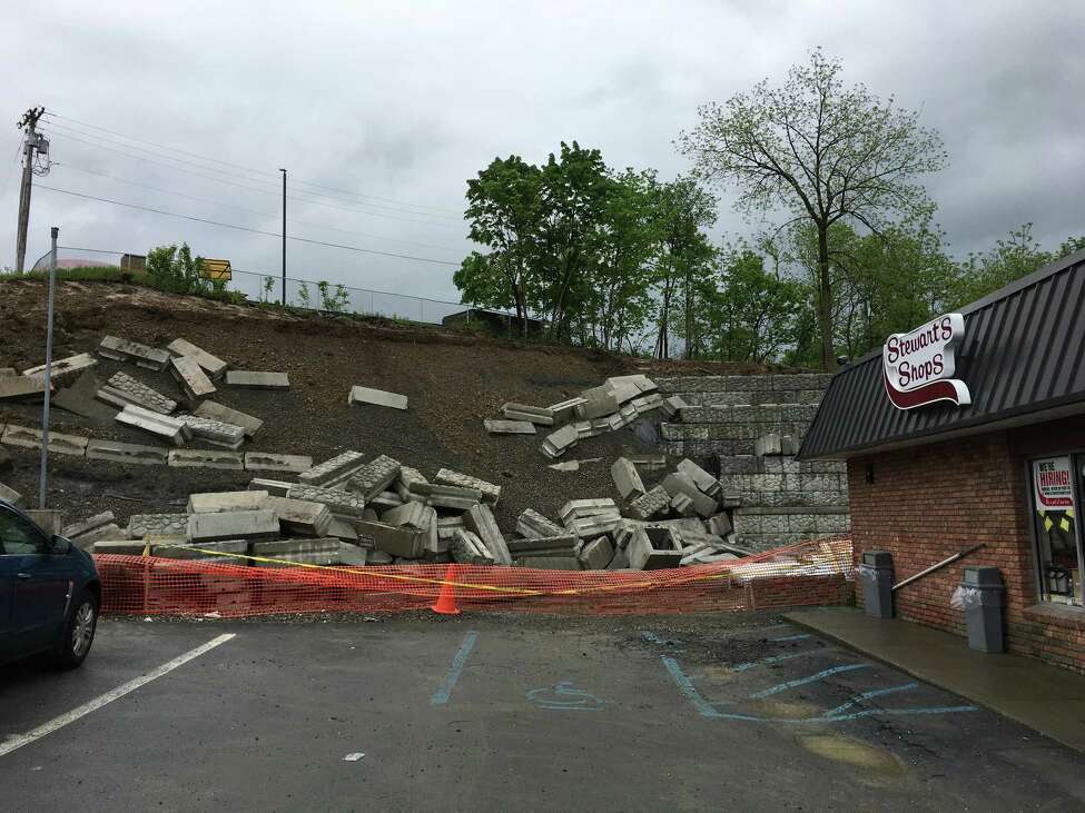 Wall behind Troy Stewart's collapses