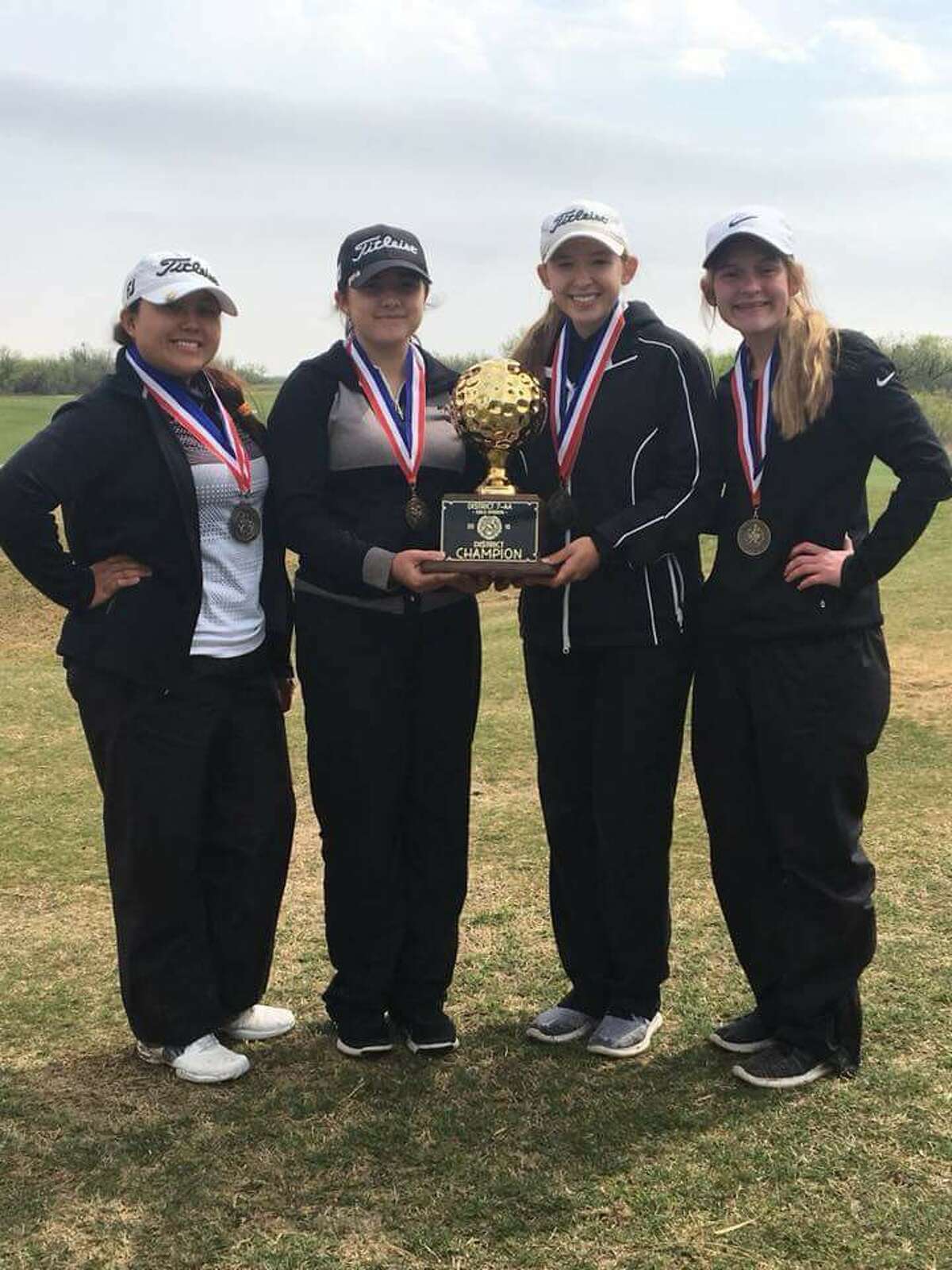 The Forsan girls golf team, from left, Razyl Yanez, Alexis Stercks, Jillian Jones and Sara Tarbet, pose after winning the District 7-2A championship April 2 in San Angelo. Courtesy photo