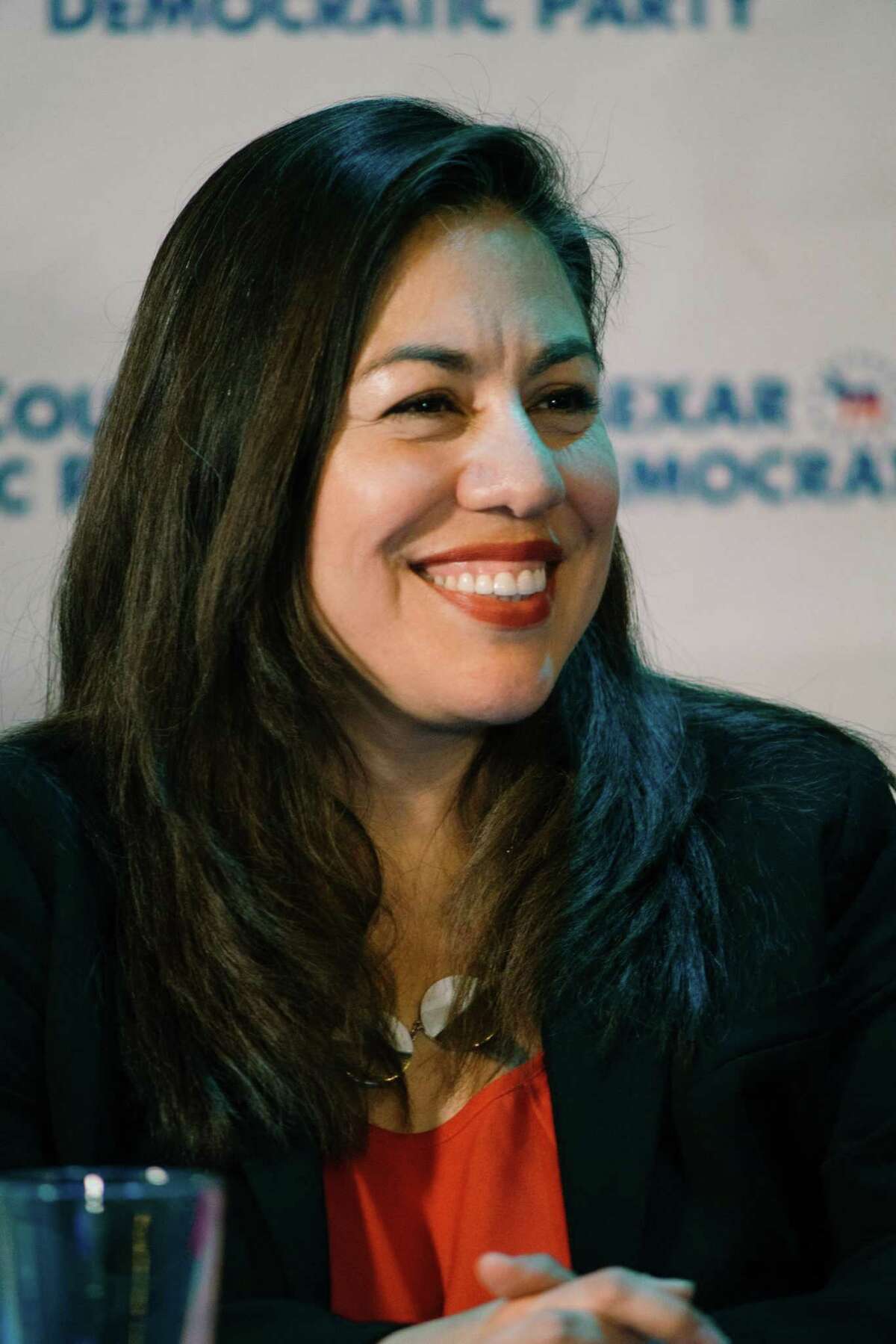 Democratic Candidate Queta Rodriguez smiles during a debate in January. She’s seeking to oust longstanding Bexar County Commissioner Paul Elizondo for the Precinct 2 seat.