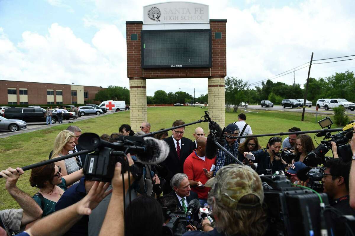 Gov. Greg Abbott speaks to the media on the grounds of Santa Fe High School. The governor also attended a service at Arcadia First Baptist Church in Santa Fe.