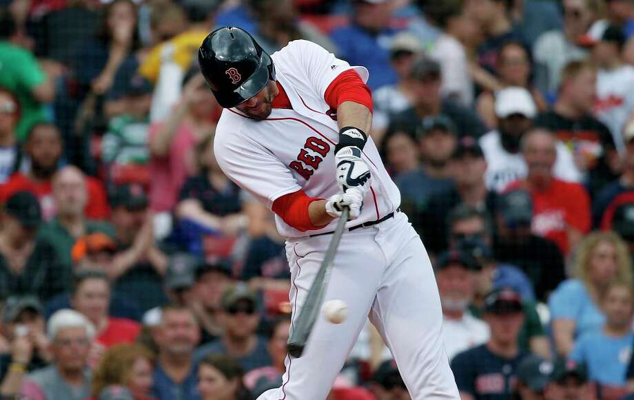 Boston Red Sox's J.D. Martinez hits a two-run home run during the fifth inning of a baseball game against the Baltimore Orioles in Boston, Sunday, May 20, 2018. (AP Photo/Michael Dwyer) Photo: Michael Dwyer / AP2018