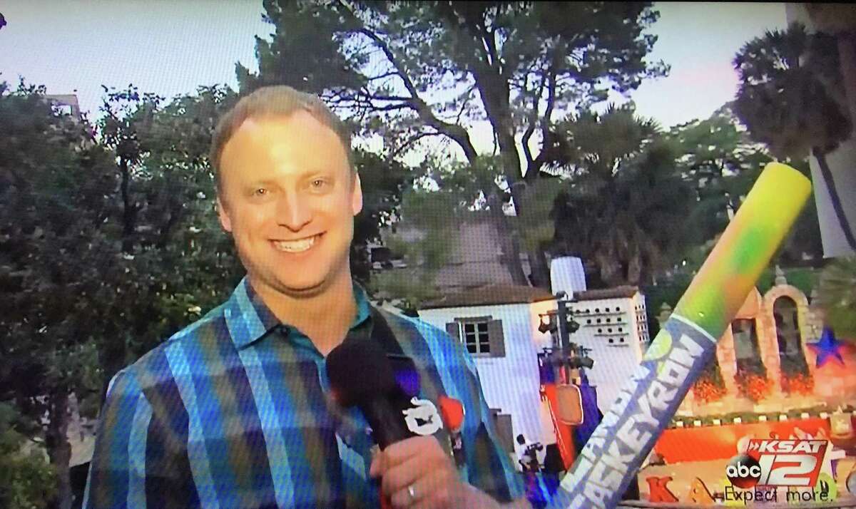 Adam Caskey brings big smiled during Fiesta parades with his confetti canon.