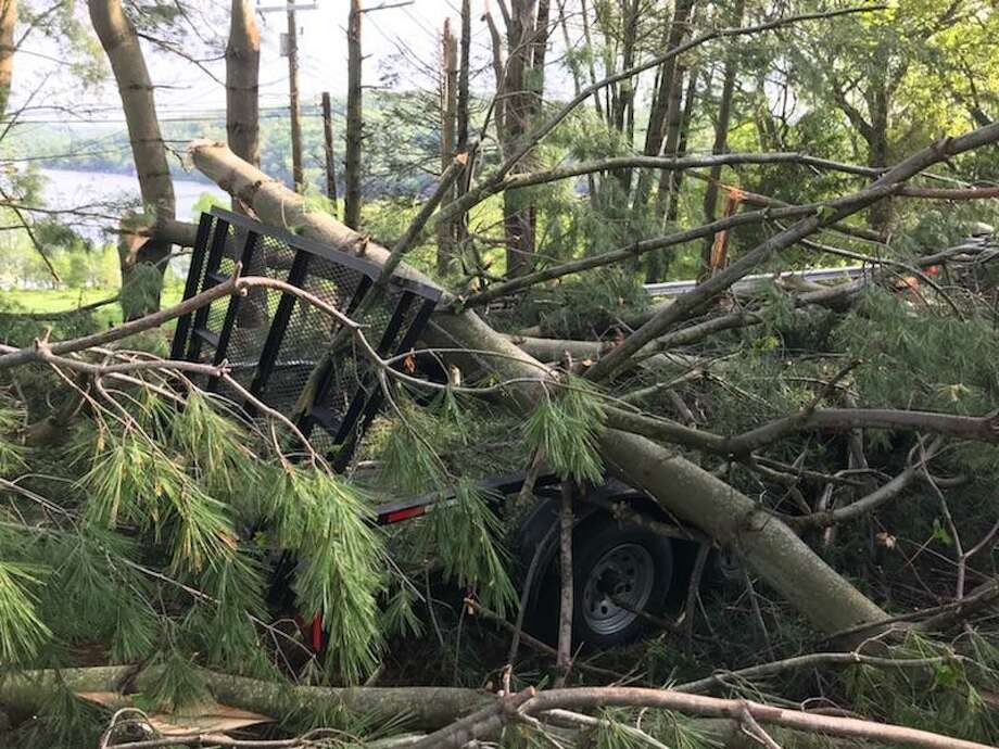 Downed trees last week at Squantz Pond State Park crushing one of the trailers. Photo: Contributed Photo / DEEP