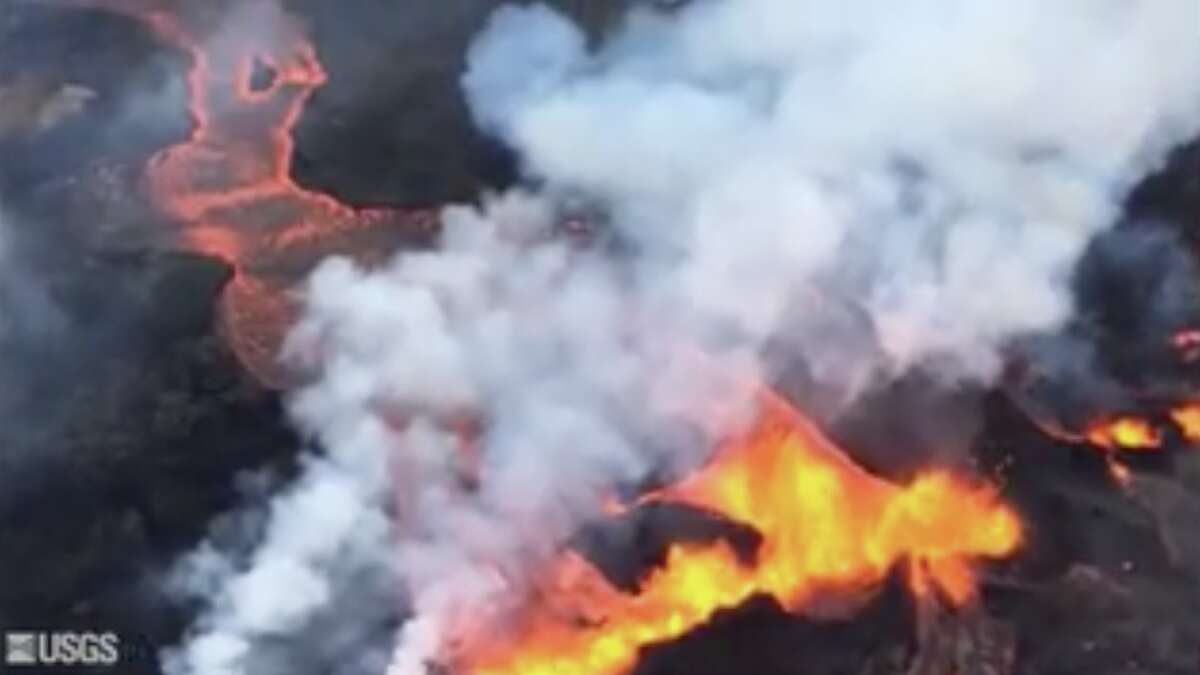 Watch a 'lava boat' sail down a molten river in Hawaii