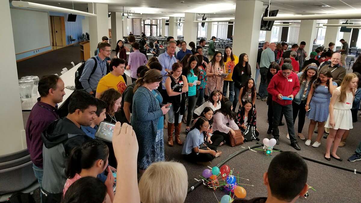 Sophomores in the P-TECH program at a Colorado high school created their own robots to have a 'Battle Bots' activity assisted by IBM mentors.