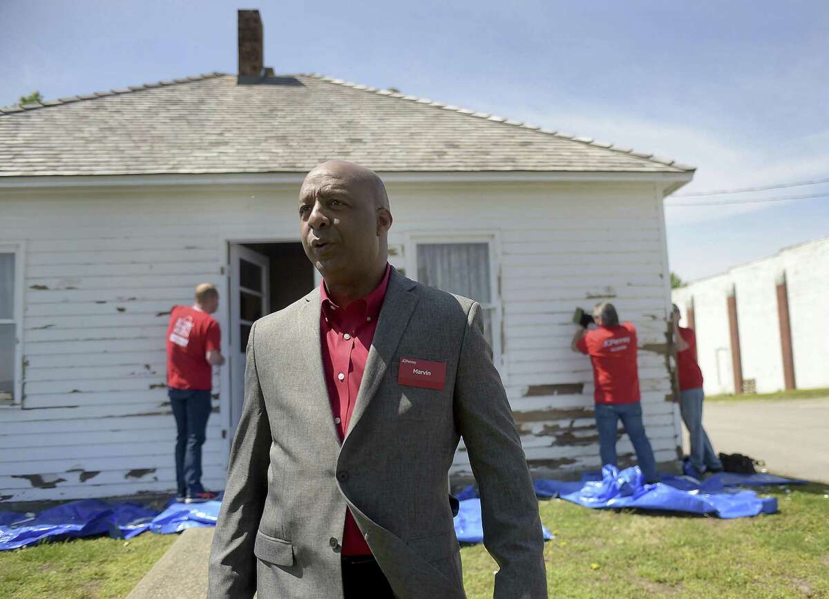 In this April 18, 2017, photo, Marvin Ellison, CEO of J.C. Penney Co., visits the boyhood home of the company's founder James Cash Penney in Hamilton, Mo. J.C. Penney's CEO is leaving the company to become the top executive at Lowe's. The announced departure of Ellison on Tuesday, May 22, 2018, sent shares of the besieged department store tumbling more than 12 percent to what may become an all-time low.