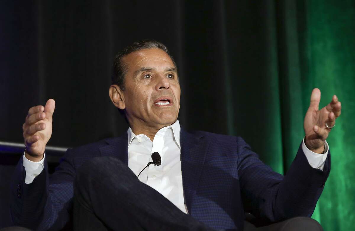 FILE - In this March 8, 2018, file photo, California gubernatorial candidate, former Los Angeles Mayor Antonio Villaraigosa, a Democrat, discusses the state's housing problems at a conference in Sacramento, Calif. Charter school advocates are far outpacing teachers unions in spending to support candidates for California governor and state schools chief. Wealthy donors who support charter schools and education reform have poured more than $22 million into independent committees to support Villaraigosa for governor and former schools executive Marshall Tuck for state schools chief. (AP Photo/Rich Pedroncelli, File)