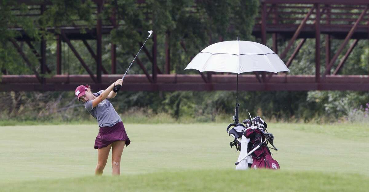 Halle Whitney of Magnolia plays her third shot on the second hole during the final round of the Class 5A UIL State Golf Championships at White Wing Golf Club, Tuesday, May 22, 2018, in Georgetown.