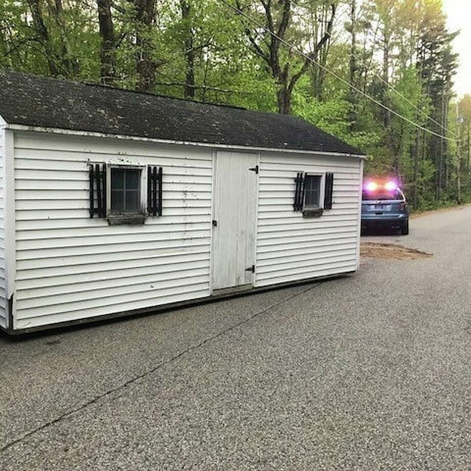 Three men allegedly stole a 25-foot shed from a foreclosed property in Maine and dragged it down a road behind a pickup truck, Maine State Police said. Matthew Thompson of Lebanon, Maine;  Timothy James of Pembroke, N.H.; and Robert Breton of Milton, N.H., face various charges including theft by unauthorized taking or transfer, reckless conduct and criminal mischief. Photo: Facebook.com/MaineSP/