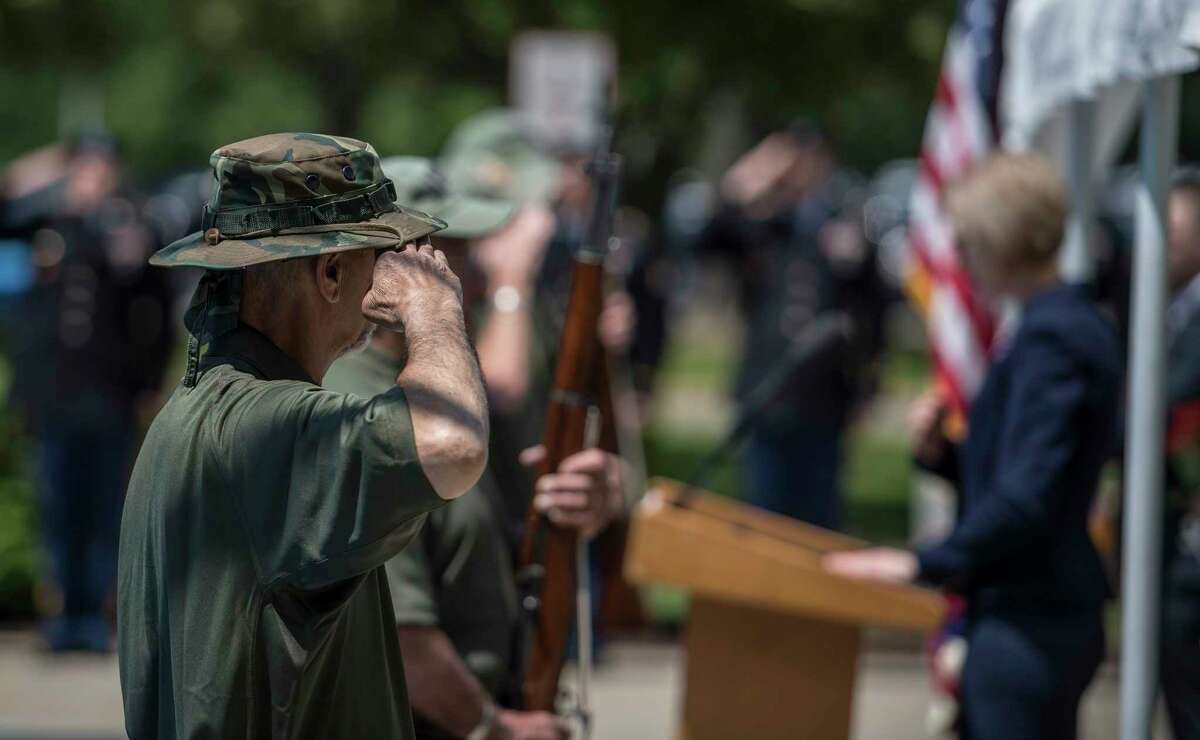Members of the Tri County Council Vietnam-Era Veterans Color Guard hand salute after posting the colors at the 25th annual Memorial Day Ceremony at the Department of Labor on the Harriman Campus Wednesday May 23, 2018 in Albany, N.Y. (Skip Dickstein/Times Union)