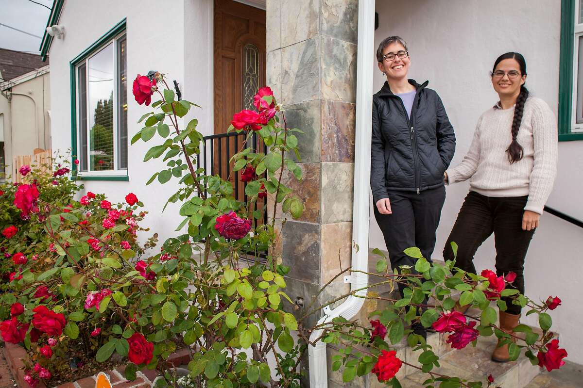 Stephanie Leveene and her wife Nicol Hammond (l-r) at the new home in Hayward, CA after they moved from San Jose where they sold their condo in a "off market," sale with out an open house to sell it quickly to be able to pay for their new home, Tuesday 22 May 2018 in Hayward, CA. (Peter DaSilva Special to the Chronicle)