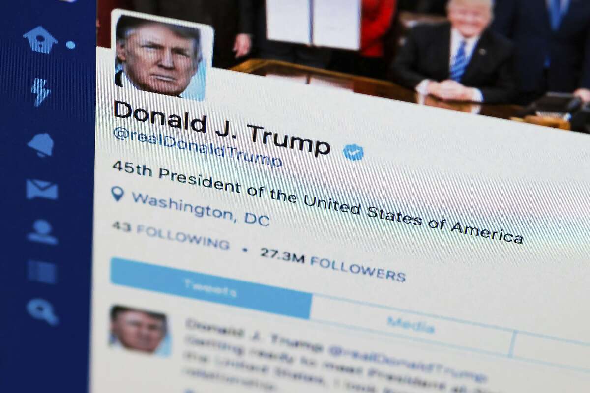 FILE - This April 3, 2017, file photo shows U.S. President Donald Trump's Twitter feed on a computer screen in Washington. President Donald Trump violates the U.S. Constitution's First Amendment when he blocks critics on Twitter for political speech, a judge ruled Wednesday, May 23, 2018. (AP Photo/J. David Ake, File)