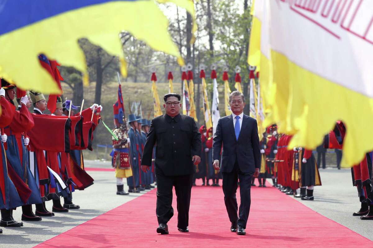 North Korean leader Kim Jong-un (left) walks alongside Moon Jae-in, the president of South Korea, at the demilitarized border village of Panmunjom in late April 27. A reader says Kim Jong-un may be getting the upper hand over President Trump regarding the proposed talks over the nuclear disarmament of North Korea.