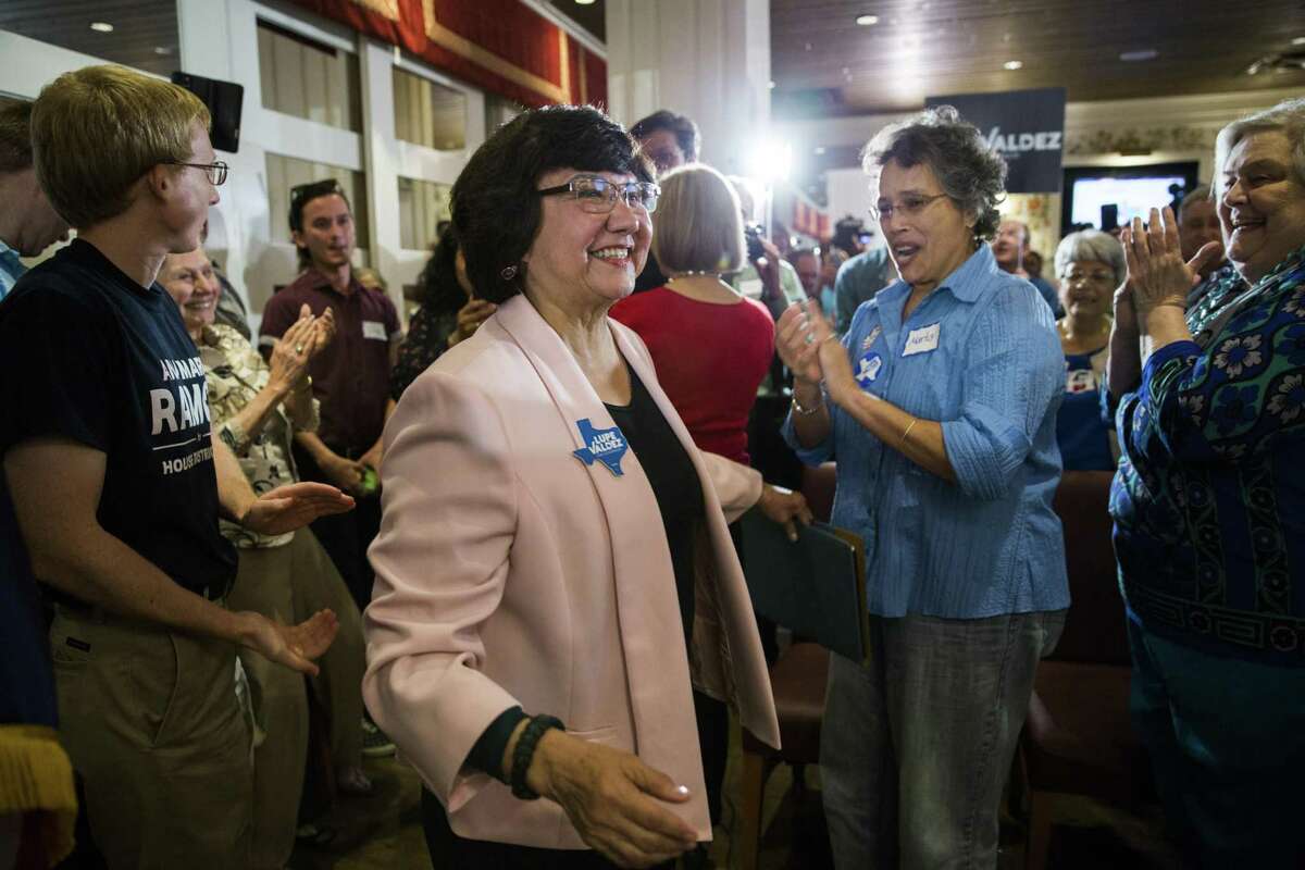 After securing the Democratic nomination for Texas governor, former Dallas County Sheriff Lupe Valdez makes her way to a podium at Ellen's in Dallas on Tuesday, May 22, 2018.