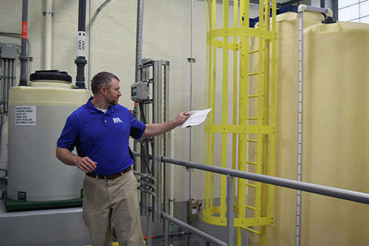 Community members tour the city’s new water treatment facility Thursday after a ribbon-cutting ceremony.