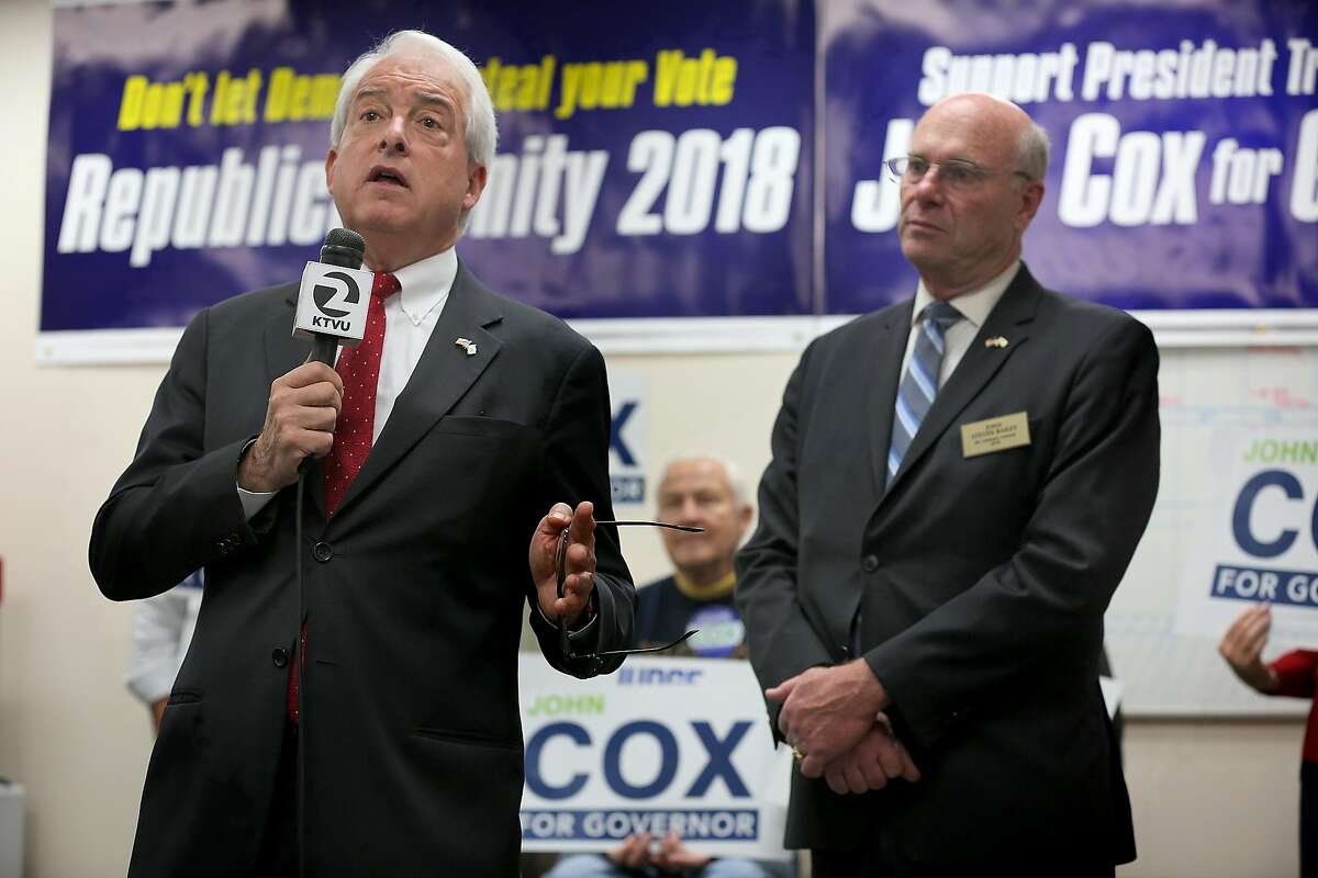 GOP candidates, John Cox (left) for governor and Steve Bailey (right) for attorney general have a press conference at the San Mateo Republican Party Headquarters on Thursday, May 24, 2018 in Burlingame, Calif.