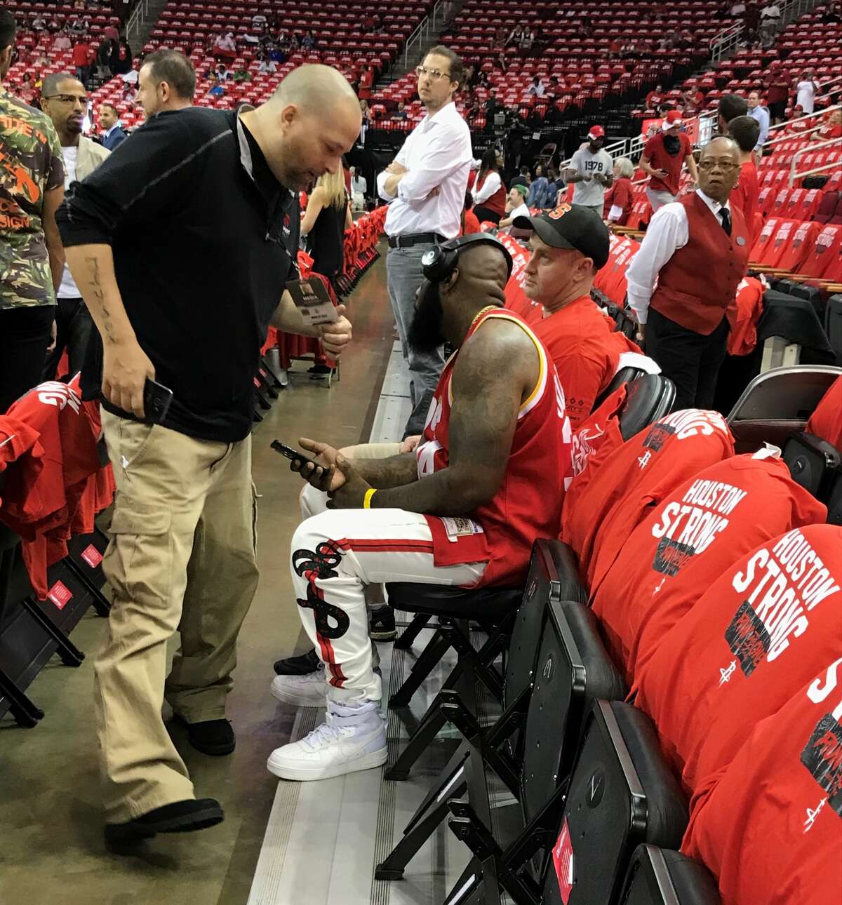 Rapper Trae tha Truth (seated) talks with 790 AM's Jayson Braddock (left) before Game 5 of the Rockets-Warriors Western Conference finals on Thursday, May 24, 2018 at Toyota Center.