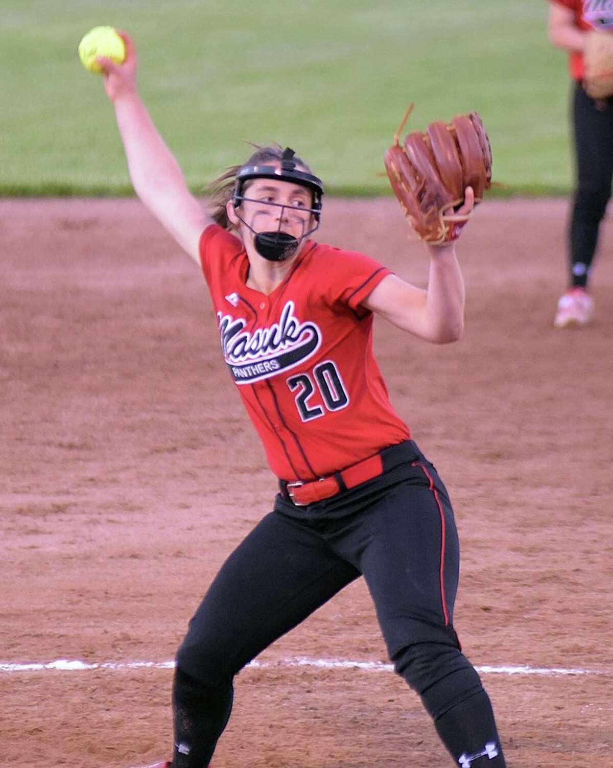 Masuk's Maddie Procyk winds up for a pitch in the SWC softball semifinals at Deluca Field (Photo John