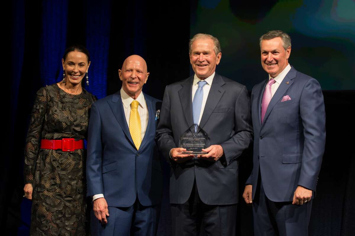 Sue and Lester Smith with President George W. Bush and Gary Markowitz