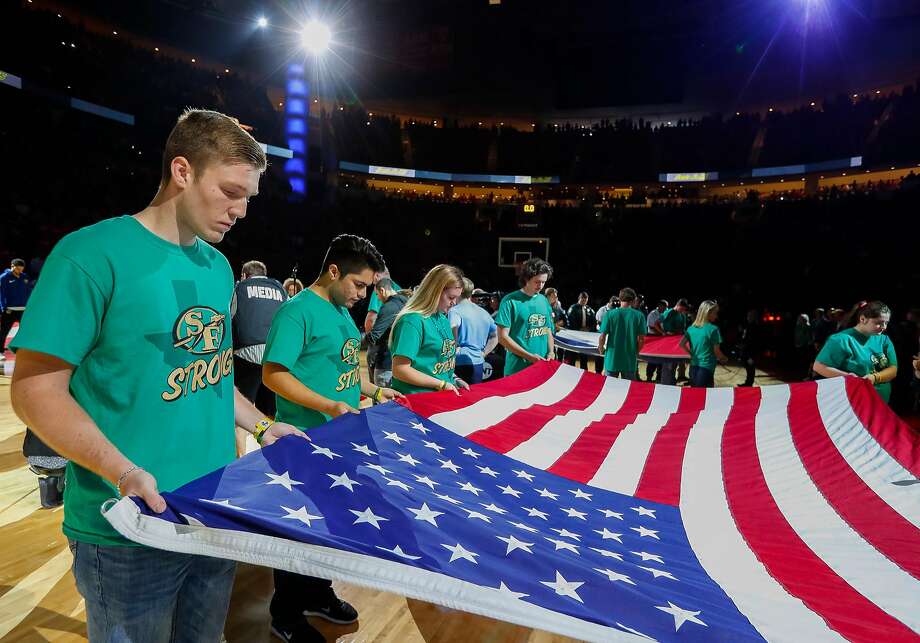 from santa fe high school in texas hold an american flag during