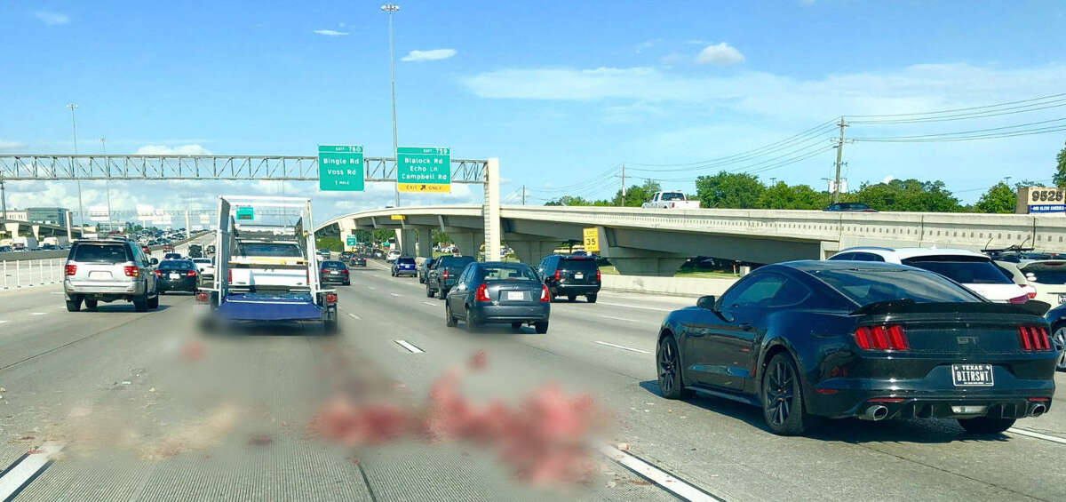 A lost load of butchered pigs made the usual commute along I-10 a little difficult for travelers on Thursday afternoon. The photo has been edited for graphic material. For memes that make Houston traffic a little more tolerable, see the following gallery