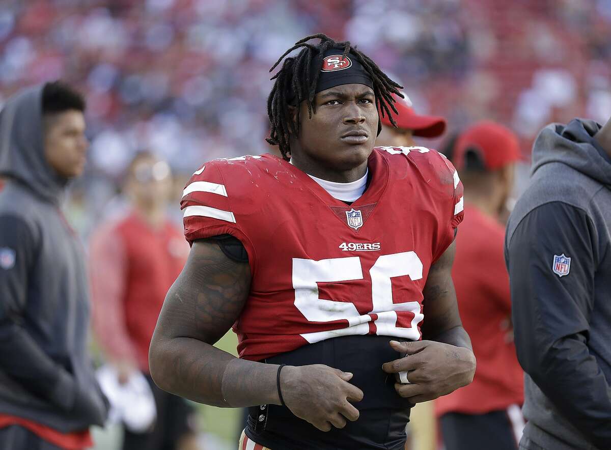 FILE - In this Oct. 22, 2017, file photo, San Francisco 49ers linebacker Reuben Foster (56) stands on the sideline during an NFL football game against the Dallas Cowboys in Santa Clara, Calif. A Santa Clara County judge has ruled that San Francisco 49ers linebacker Reuben Foster will not have to stand trial on domestic violence charges after the accuser recanted her allegations at a preliminary hearing, Wednesday, May 23, 2018. (AP Photo/Marcio Jose Sanchez, File)