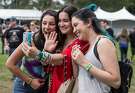 (From left) Mila Sugarman, Cianna Book and Liz Granger of Santa Rosa FaceTime with a friend while watching Flor perform on the Midway Stage during the first day of Bottle Rock Music Festival in Napa, Calif. Friday, May 25, 2018